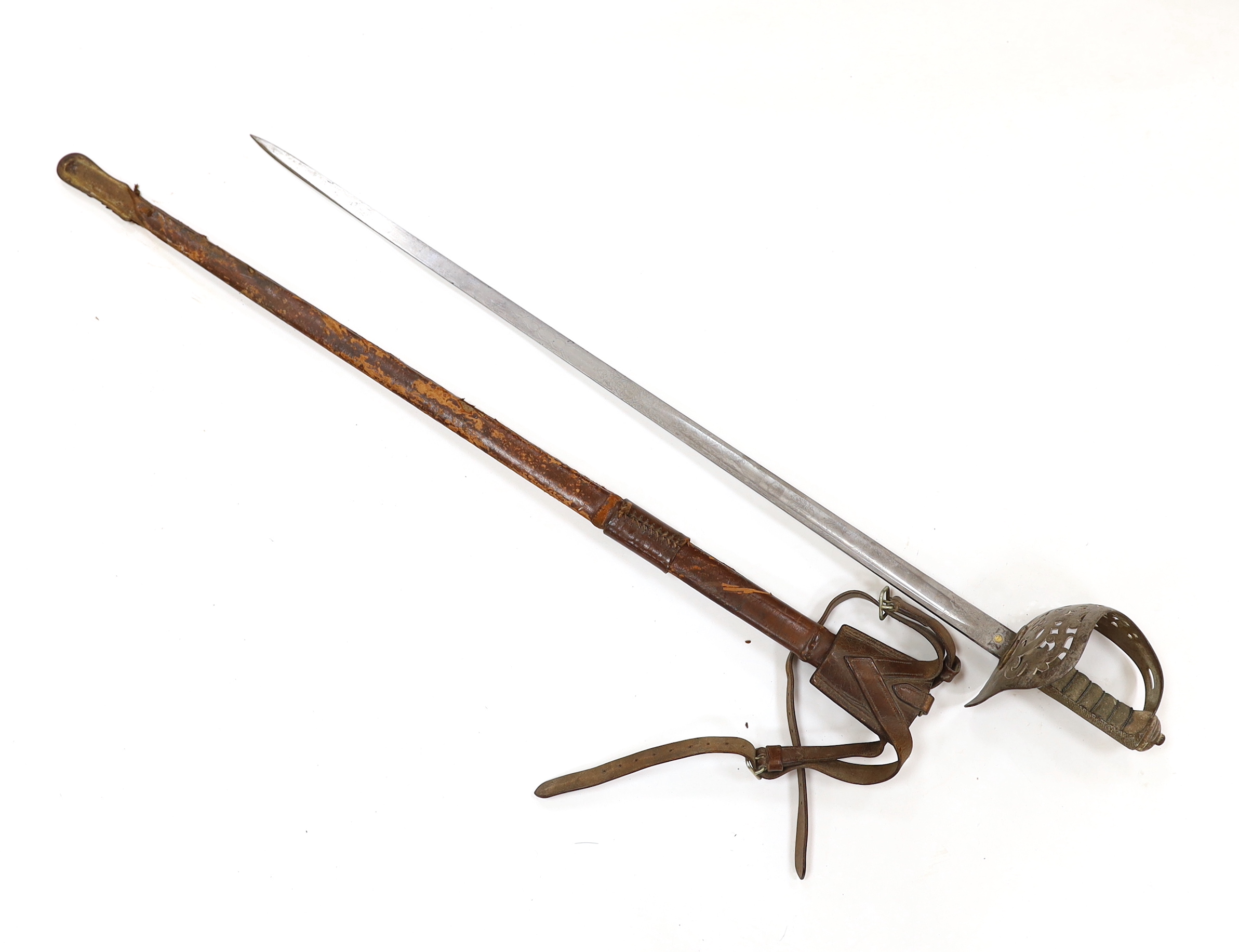 A Victorian 1897 pattern infantry officer's sword, maker Robert Mole & Sons, Birmingham, marked War and India offices, with scabbard and leather hanger, blade 82cm